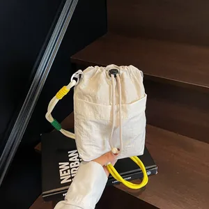 Fashion Women Nylon Drawstring Bucket Bag Contrast Color Crossbody Bag With Woven Rope Strap Casual Shoulder Handbag Purse