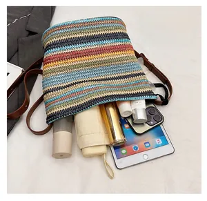 Top view of striped woven bucket bag showing large interior space for tablets and umbrellas