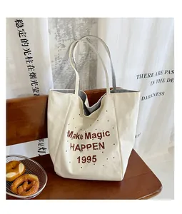 Detail of canvas tote bag with retro lettering on a wooden bench in aesthetic setting