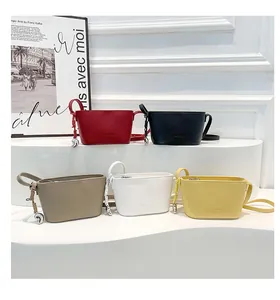 Macro detail of lychee textured bucket bags in multiple colors with fashion embossing