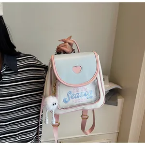 Detail of cute ita bag featuring heart window and Tis the Season KEDDY embroidery