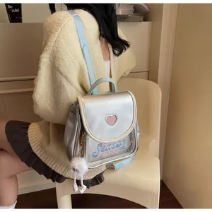 Detail view of mini dopamine ita bag with heart cut-out and transparent PVC pocket