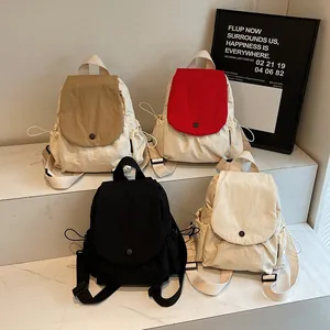 Minimalist canvas backpacks in multiple colors with waterproof nylon and flap design