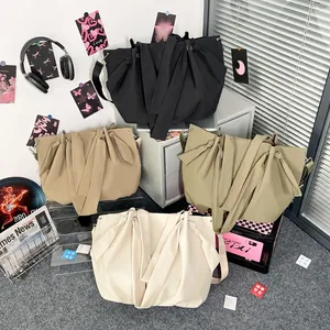 Large capacity canvas tote bag with bow design in four colors for daily commuting