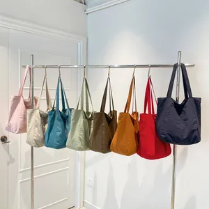 Minimalist large capacity canvas tote bags in eight solid colors for daily commute