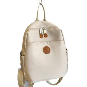 Cream nylon casual backpack with large capacity and double zipper design for travel