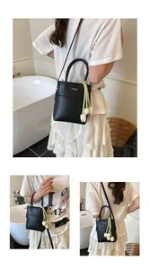 Chic black mini crossbody bag with a white tulip charm and a leather handle for women