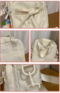 Detail of cream nylon crossbody bag featuring a cute bow pocket and brand logo