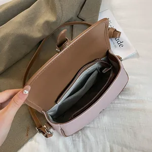 Minimalist square flap crossbody bag in pink-purple and brown textured leather