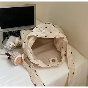 Chiffon mesh tote bag with red bow pattern and drawstring closure for summer beach vacation