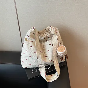 Women Canvas Drawstring Shoulder Bag Large Capacity Off-White Red Bow Print Tote Bag With Plush Pendant Japanese Handbag