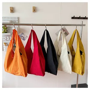 Detailed display of large capacity canvas tote bags in five vibrant trendy colors