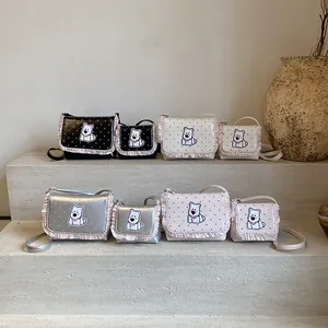 Polka dot crossbody bags for kids with cute dog embroidery and pink lace trim in two sizes