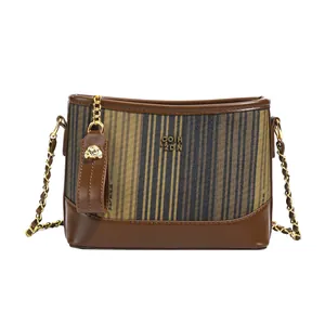 Sac seau matelassé à rayures en toile marron et cuir avec bandoulière chaîne