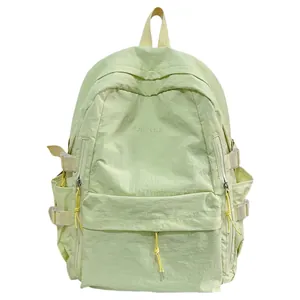 Minimalist light green large capacity student backpack with stylish water-resistant nylon fabric