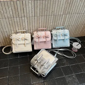 Eleganti borse da donna con manici di perle e fiocchi in quattro delicati colori pastello