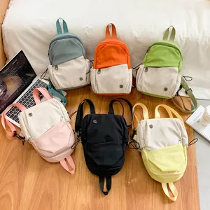 Lightweight minimalist mini backpack set in six vibrant colors for casual travel and daily use