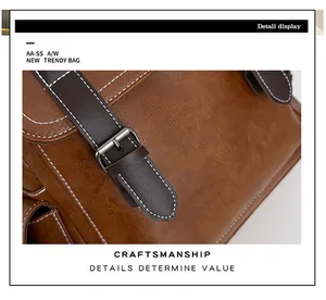 Detail view of brown PU leather bag showing neat stitching and silver metal buckle