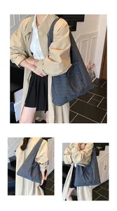 Detailed views of the large plaid tote bag with tie-bow shoulder strap and side drawstring