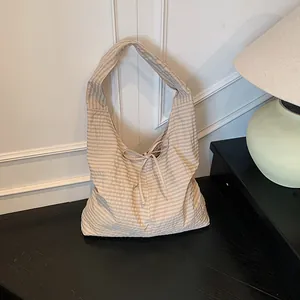 Large checkered tote bag with bow tie ribbon, chic underarm shoulder bag for daily commute