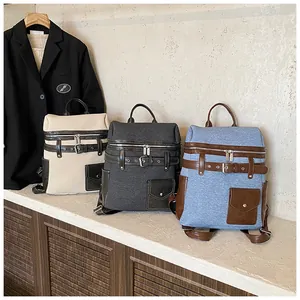 Detailed comparison of three large-capacity backpacks in cream, dark grey and light blue fabric