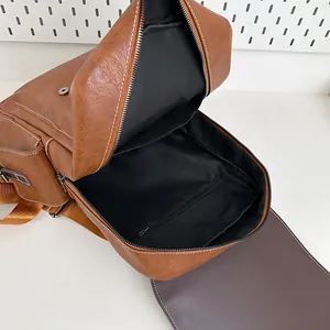 Brown faux leather business backpack with large capacity and polished metal buckle