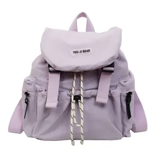Sac à dos scolaire violet avec rabat contrasté et boucles pour étudiants