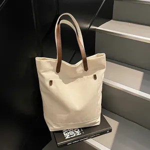 Minimalist Large Capacity Canvas Tote Bag For Women Casual Solid Color Shoulder Bag With Front Pocket Metal Studs Strap