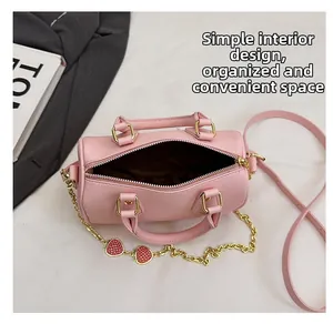 Top view of pink Boston bag interior with simple design and spacious storage space