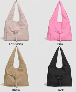 Detail view of large tote bags in four colors: Lotus Pink, Pink, Coffee, and Black