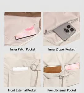 Detail showing inner pockets and front compartments of the beige commuter tote bag