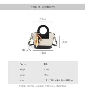 Gedetailleerde maatspecificaties voor de vintage canvas bucket bag met productafmetingen tabel