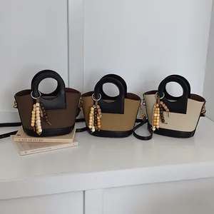 Vintage canvas emmertassen in drie kleuren met houten kralen en ronde handvatten