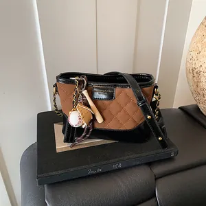 Vintage Rhombic Quilted Bucket Bag For Women Frosted PU Leather Crossbody Bag With Sporty Baseball Pendant Chain Strap