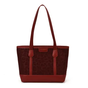Chic burgundy leopard print tote bag with smooth leather trim and long shoulder straps
