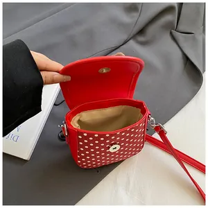 Chic red shoulder bag with white polka dots, PU leather style and magnetic closure design