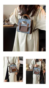 Details der Vintage-Handtasche aus Denim-Patchwork und Leder mit Schultergurt