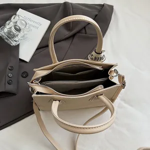Beige PU leather crossbody bag with multiple compartments and fashion ribbon decoration