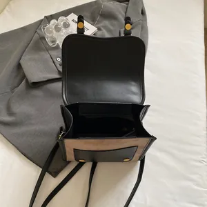 Retro patchwork women's backpack in black faux leather and brown suede with gold studs