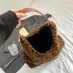 Fashionable leopard print faux fur tote bag with brown synthetic leather handle for women