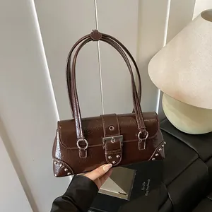 Retro dark brown patent leather underarm bag with silver studs and buckle strap