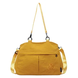 Minimalist mustard yellow nylon crossbody bag with large capacity and adjustable strap