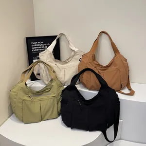 Minimalist nylon dumpling shoulder bag for women in white brown green and black