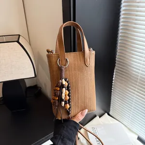 Brown woven texture mini crossbody phone bag with wooden bead tassel and top handle