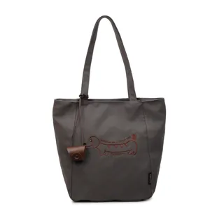 Large dark grey canvas tote bag with dachshund embroidery and mini brown purse pendant