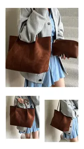 Detail of dark brown suede tote bag and matching pouch with smooth matte finish