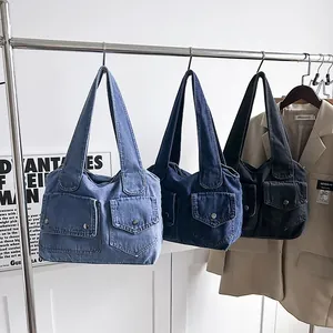 Retro-Denim-Tragetasche mit doppelten Werkzeugtaschen in Hellblau, Dunkelblau und Schwarz