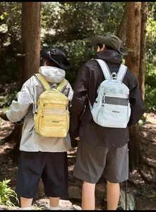 Outdoor backpacks in yellow and grey nylon with mesh pockets and BOGEWADE branding