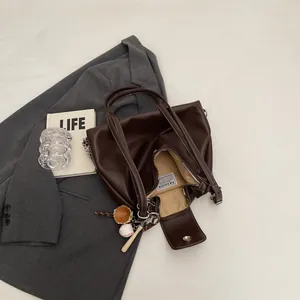 Retro brown oil wax leather tote bag with chain strap and large capacity for daily use