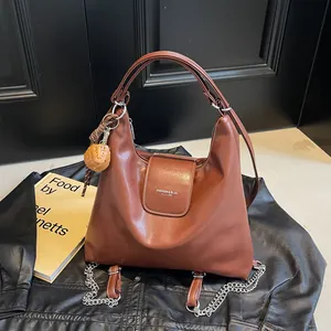 Women Vintage PU Leather Shoulder Bag Large Capacity Hobo Tote Bag With Metal Chain And Sport Pendant For Daily Commuting